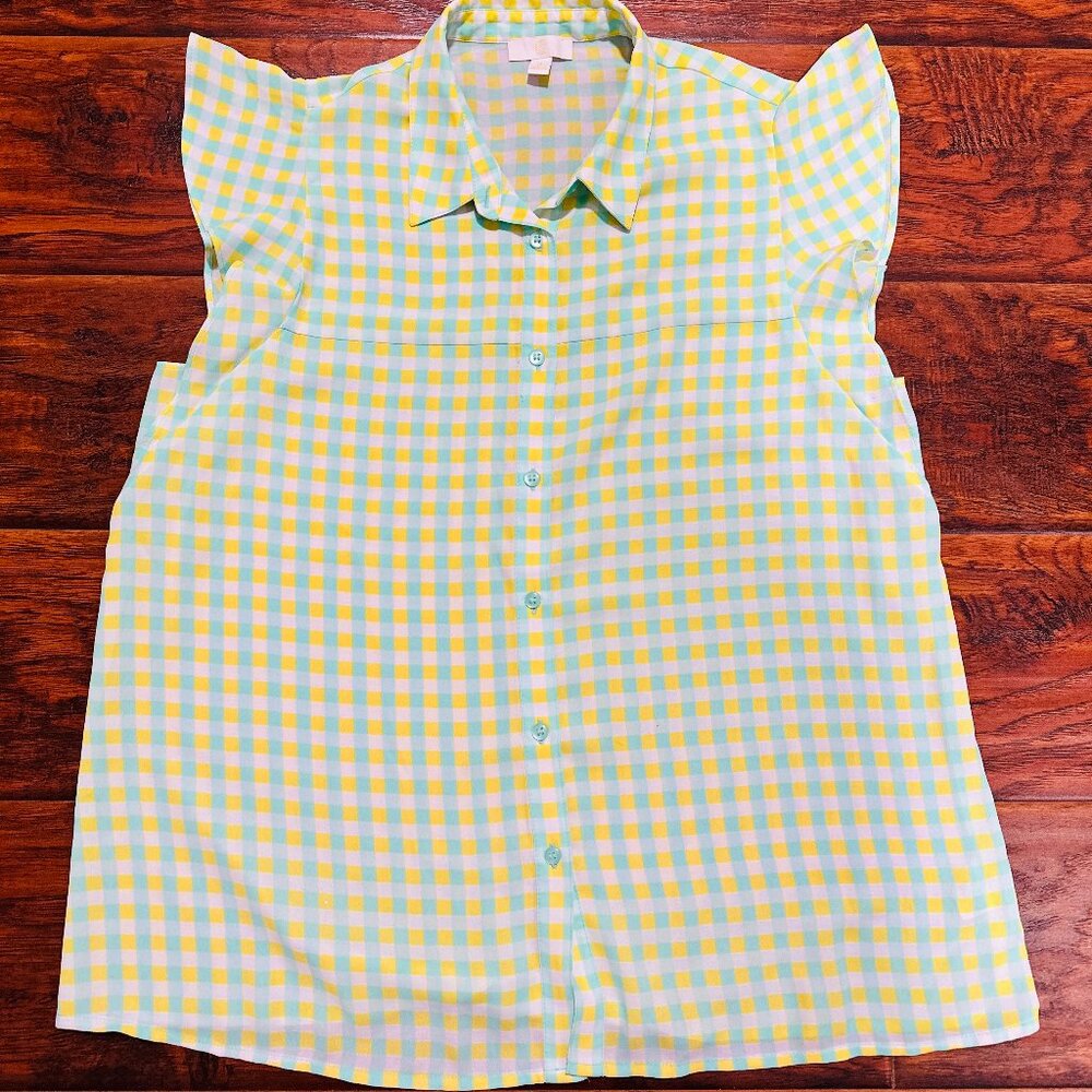 sleeveless button-up blouse with a checkered pattern